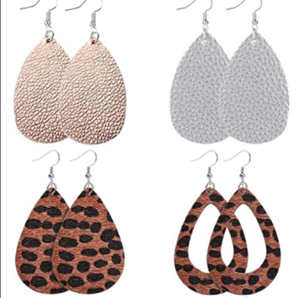 Set of four faux leather earrings.